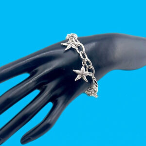 Brighton 7" Silvertone/Crystal Sea Star Charm Bracelet. 5 starfish